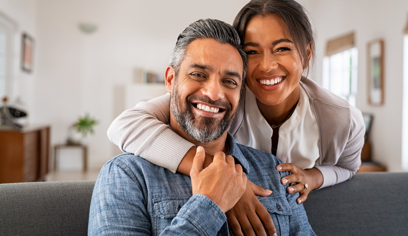 A smiling couple at home